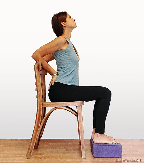 Yoga Pose: Revolved Chair with Arms Extended | Pocket Yoga