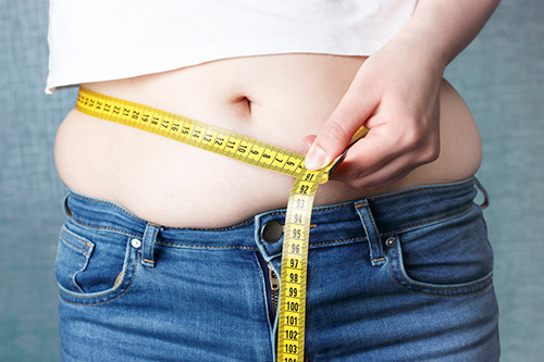 Tips to lose belly fat without dieting or even exercise
